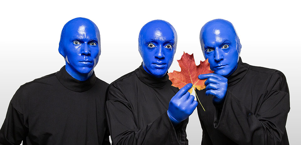 Blue Man Group performers drumming on stage at Luxor Las Vegas