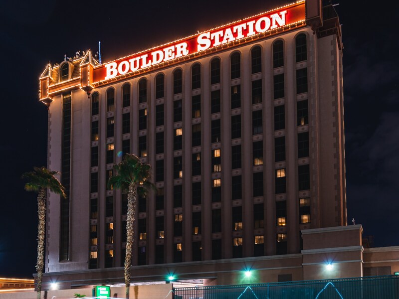The Boulder Station hotel tower at night.