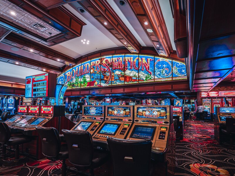 Colorful slot machines on the Boulder Station casino floor.