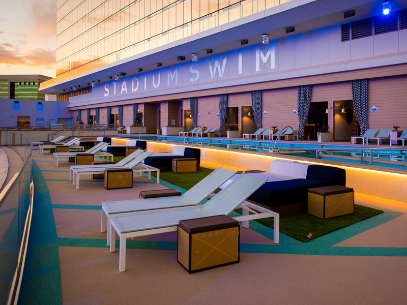 Circa’s Stadium Swim - Adults Only (21+) - Pool lounge chairs at Circa's Stadium Swim