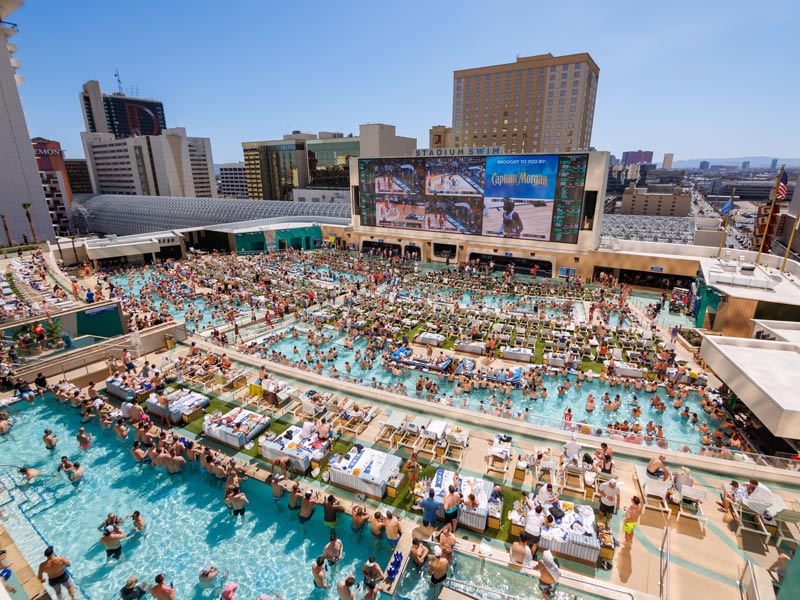 Circa’s Stadium Swim - Adults Only (21+) - Beat the heat and catch the game with multiple pools and a huge screen for viewing.
