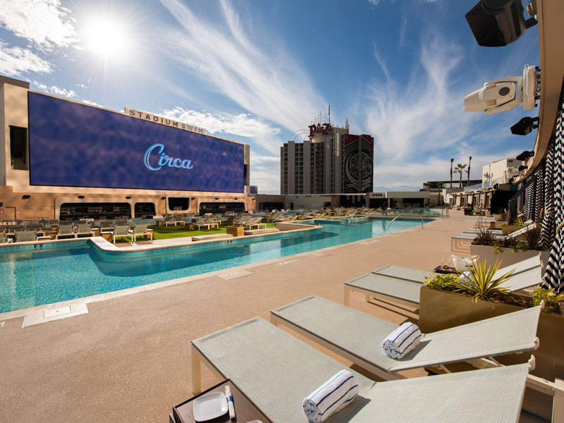 Circa’s Stadium Swim - Adults Only (21+) - Relax poolside on comfy lounge chairs as you take in sports games and entertainment.