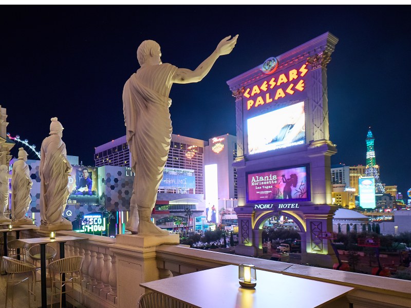 F1 Arcade Las Vegas - The bar and racing floor blend premium hospitality with Formula 1®-inspired fun.