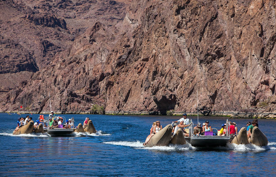 Motorized raft on the Colorado River below Hoover Dam in Black Canyon