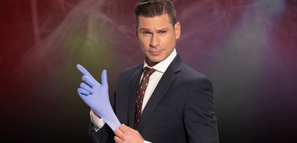 Comedy magician working closely with audience volunteers on a downtown Las Vegas stage