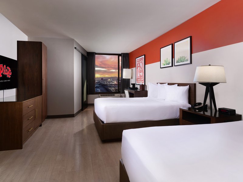 Luxe Two Queen Room offering stylish accommodations and updated comforts in the heart of downtown Las Vegas.