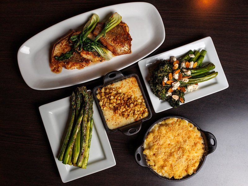 A selection of Oscar's Steakhouse favorites featuring premium entrées and elevated side dishes.