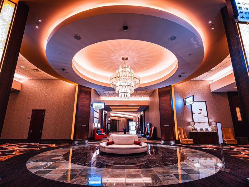 Red Rock’s ballroom lobby welcomes guests with polished stone floors, sculptural lighting and an elegant contemporary design.