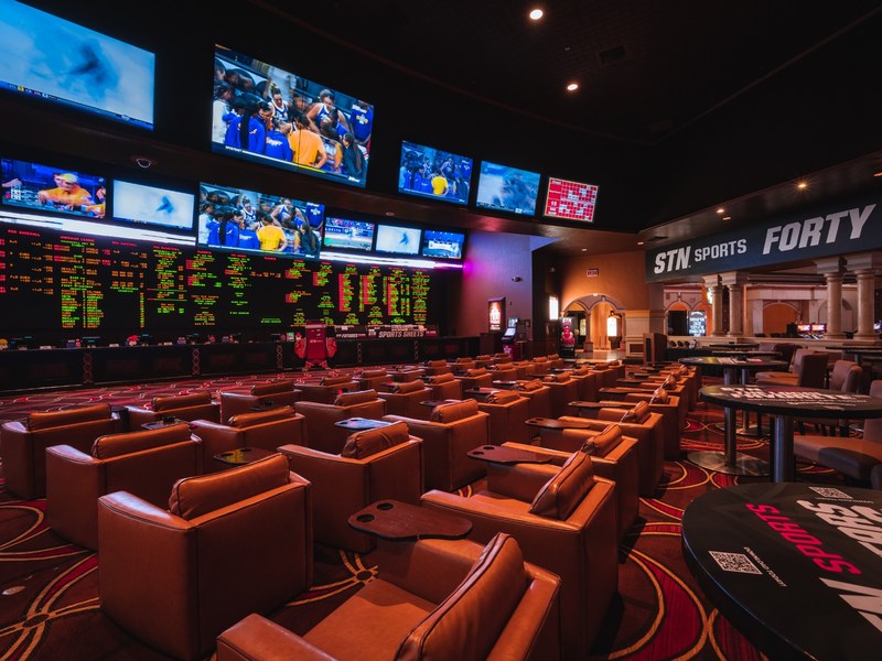 Sunset Station’s sportsbook features rows of comfortable lounge chairs, oversized odds boards and wall-to-wall screens for game-day viewing.