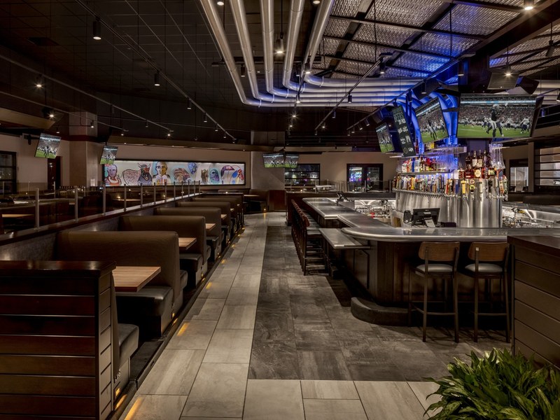 Inside Yard House, booth seating, a long central bar and abundant televisions create an easygoing spot for food, drinks and sports.