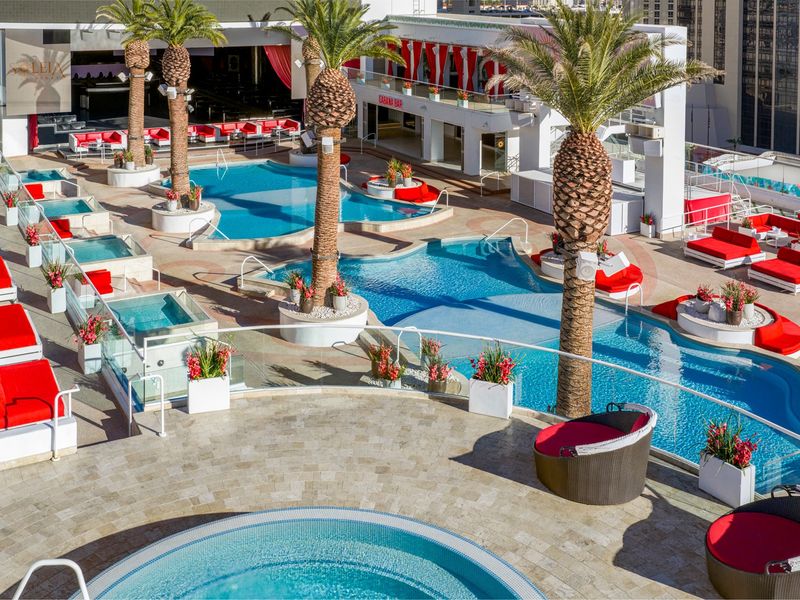An elevated aerial view showcases Soleia's rooftop pools, lounge areas, and vibrant social spaces.